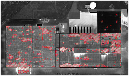 Aerial infrared image showing a survey of roof moisture
