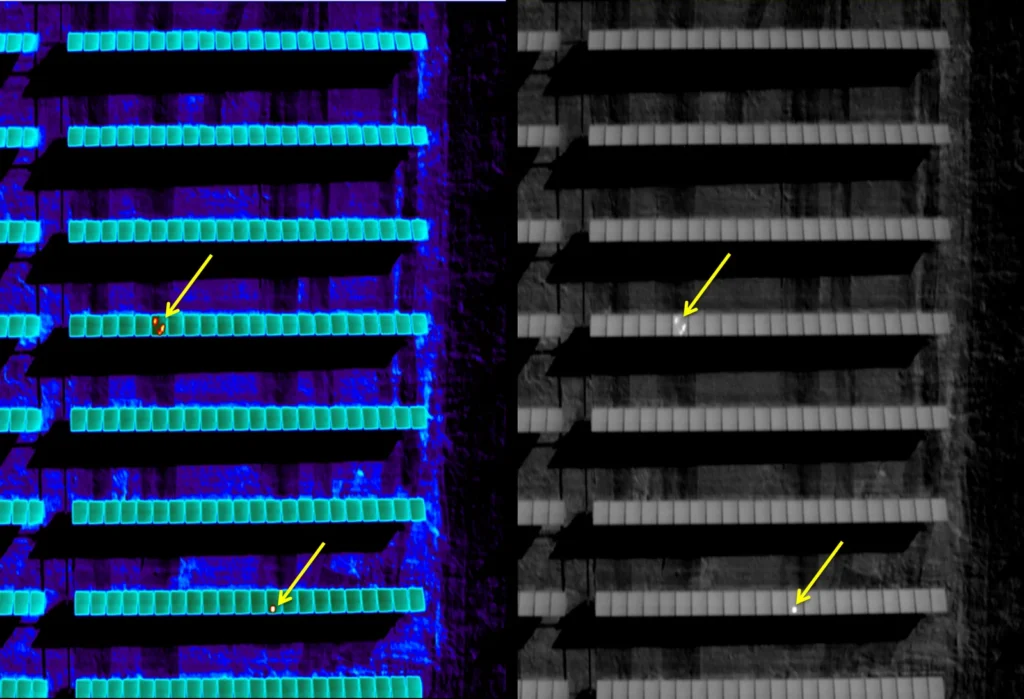 Solar field infrared survey showing thermal anomalies and hot spots across modules in a utility-scale PV array